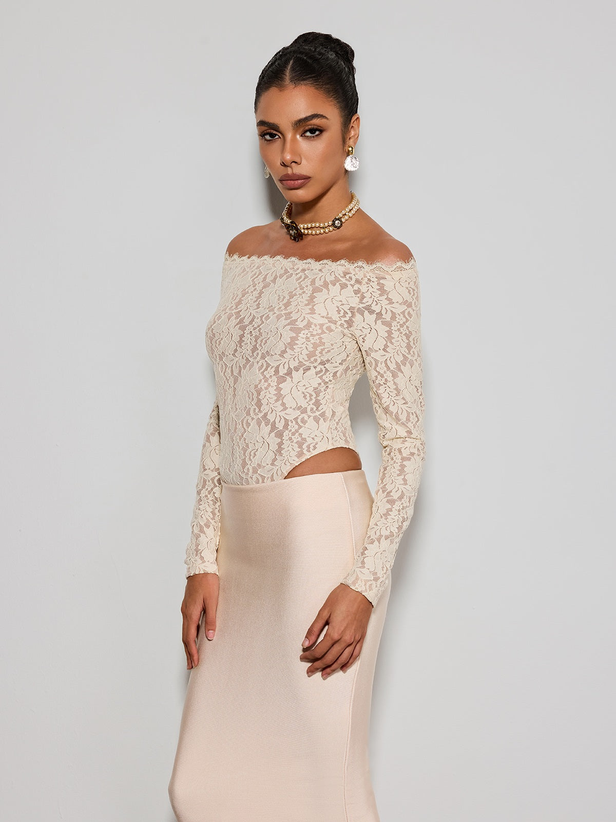 Body in pizzo Caylen senza spalline