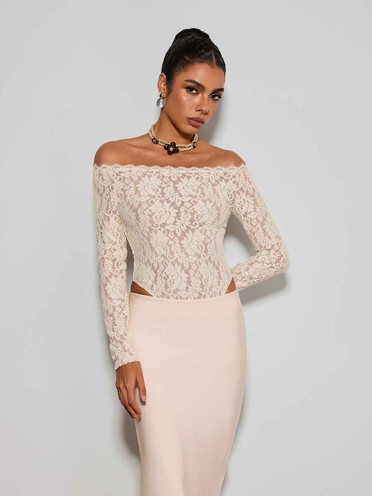 Body in pizzo Caylen senza spalline
