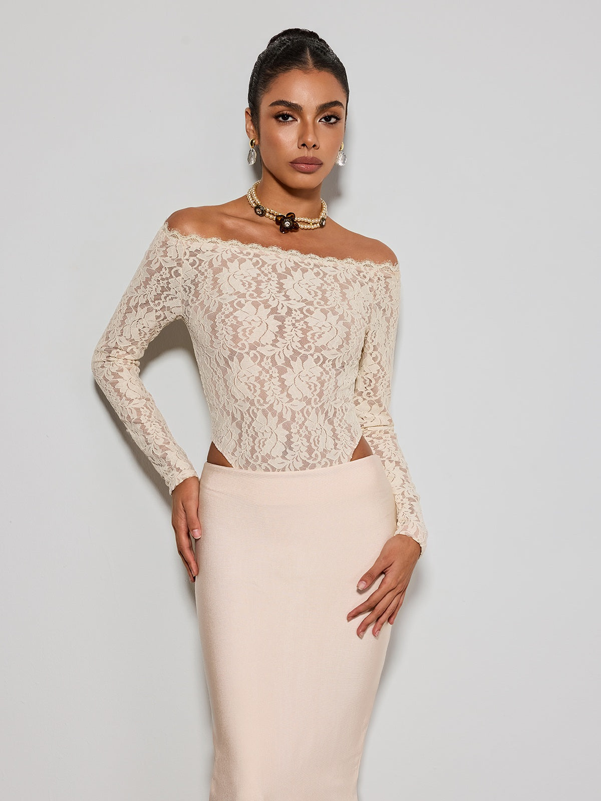 Body in pizzo Caylen senza spalline